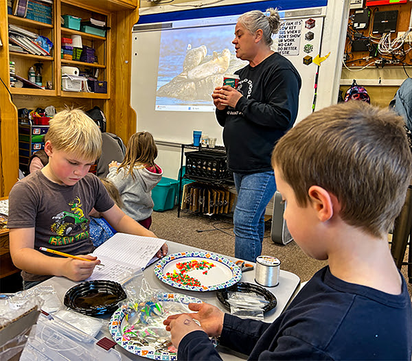 Kids making fishing lures