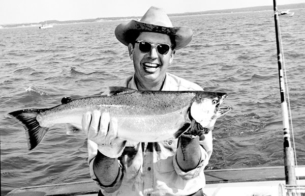 Dr. Howard Tanner holding a Salmon